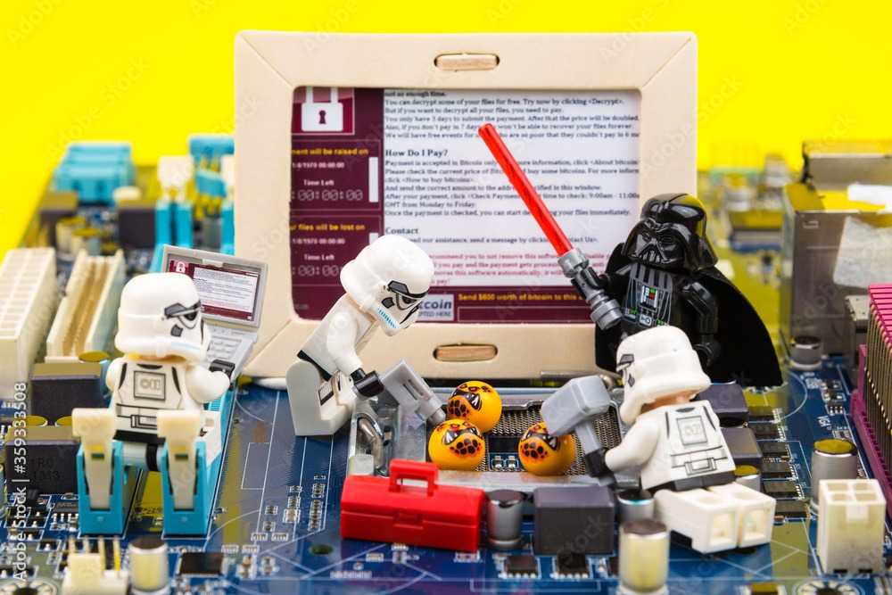 lego-star-wars-stormtrooper-are-helping-to-eliminate-malware-ransomware-wannacry-on-a-computer-motherboard